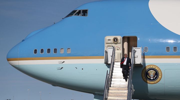 Trump arrives at the Palm Beach International Airport to spend part of the weekend at Mar-a-Lago resort on February 17, 2017.