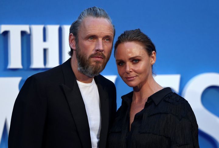 Fashion designer Stella McCartney, pictured above with her husband Alasdhair Willis, has apologised over an accident she was involved in with a taxi driver