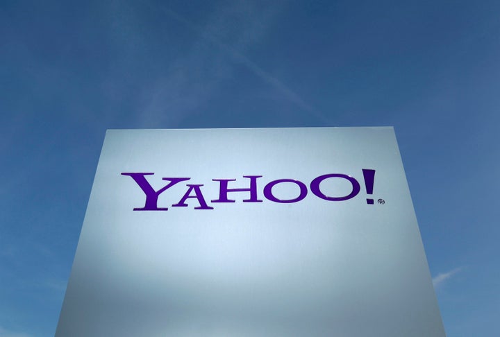 A Yahoo logo is pictured in front of a building in Rolle, Switzerland December 12, 2012. (REUTERS/Denis Balibouse/File Photo)