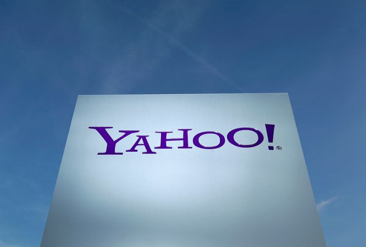 A Yahoo logo is pictured in front of a building in Rolle, Switzerland December 12, 2012. (REUTERS/Denis Balibouse/File Photo)