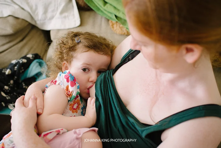 Photo Series Shows How Two Moms Tandem Nurse Their Triplets And