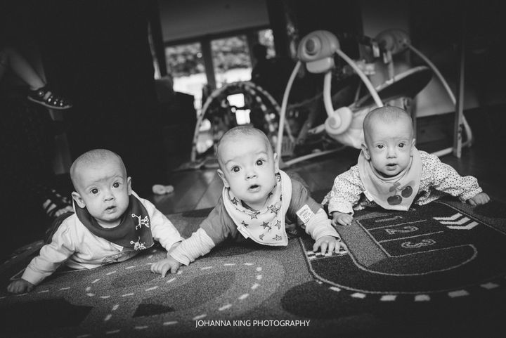 The triplets were born two months early and spent about a month in the hospital. 