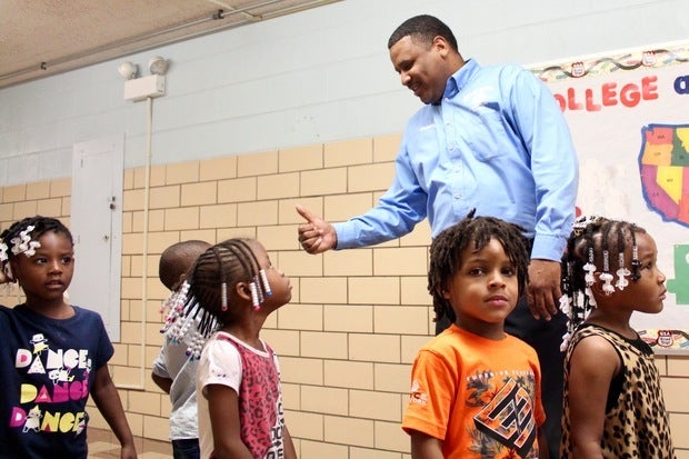 Manierre Elementary Principal Derrick Orr speaks with students.