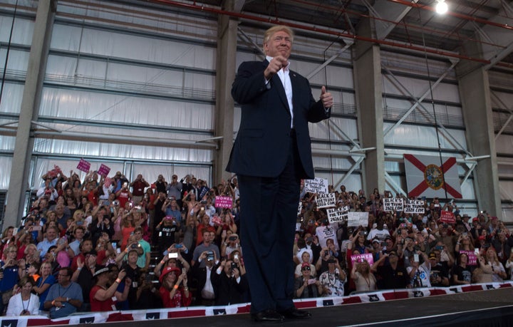 President Donald Trump arrives for a rally at the Orlando Melbourne International Airport on Feb. 18, 2017, in Melbourne, Florida.