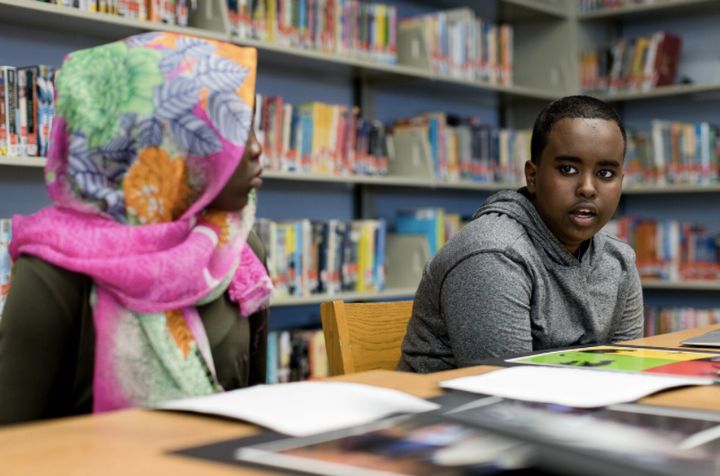 At Portland’s King Middle School, students discuss their “Four Freedoms” project based on the oil paintings of American painter Norman Rockwell. Eighth-grader Zakaria Ali, right, a student of Somali heritage, talks about how Muslims lose their freedom when Americans equate Islam with terror, as eighth-grader Hadil Ramadan, left, listens.