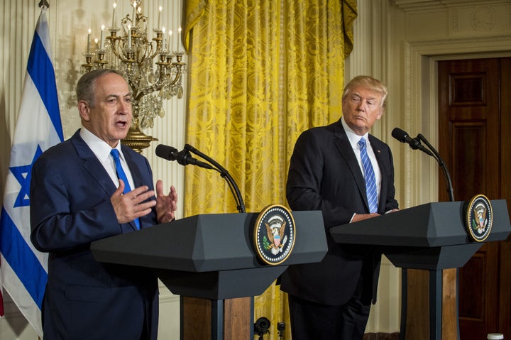 U.S. President Donald Trump listens while Benjamin Netanyahu, Israel's prime minister, speaks during a news conference at the White House on Feb. 15, 2017.