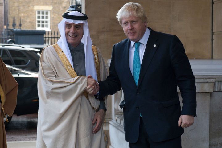 Saudi Arabia's Foreign Minister Adel al-Jubeir is greeted by British Foreign Secretary Boris Johnson