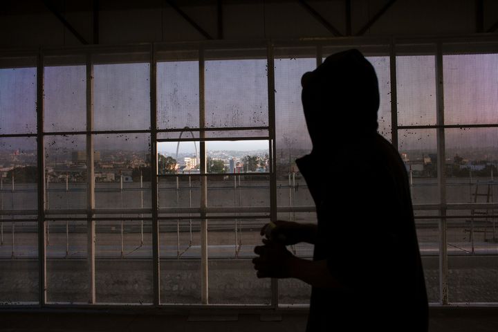 A person deported from the US is seen at El Chaparral repatriation centre in Tijuana