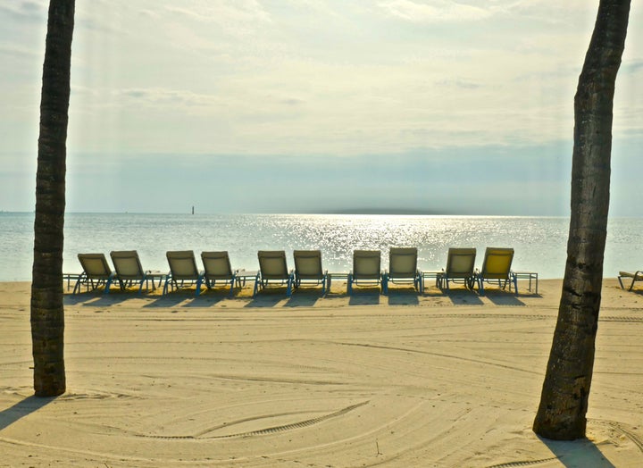 <p>Fisher Island, with its secluded beach, is an oasis for those who prefer a restful, upscale vacation </p>