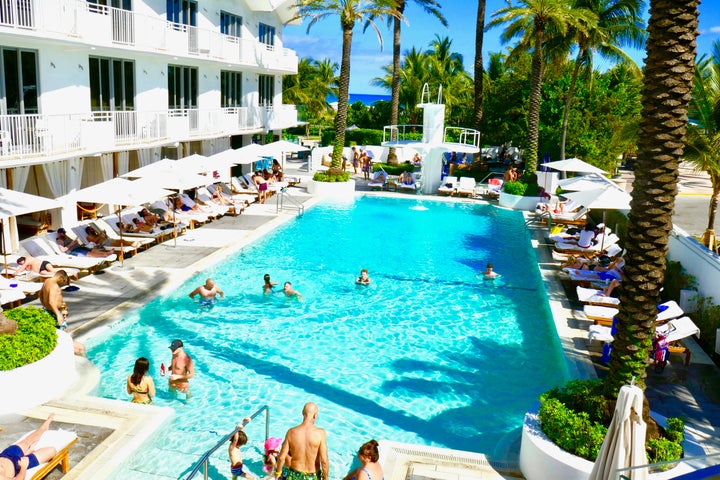 The pool area scene at the Shelborne Hotel is the essence of nouveau Miami 