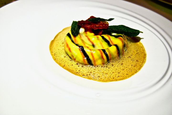 <p>Chef Brad Kilgore serves a tasty and visually pleasing Veal Raviolo “Saltimbocca” appetizer</p>