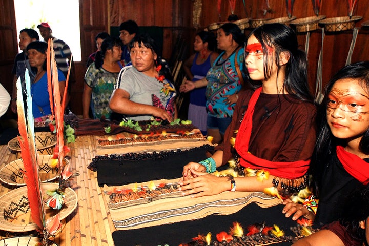 Indigenous women like the young Ashaninka pictured here are combining traditional skills with modern entrepreneurship to assert their economic independence.