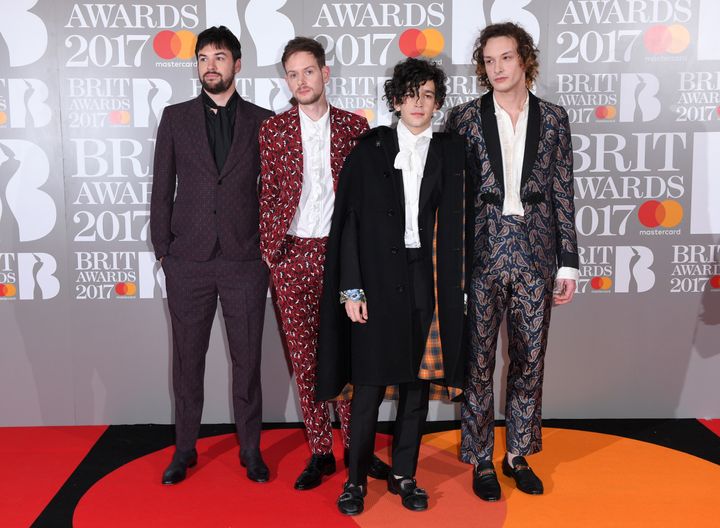 The 1975 hit the Brit Awards red carpet