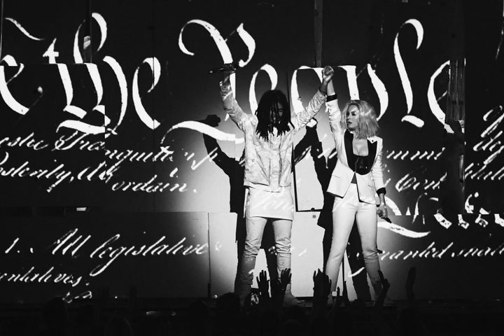 Finishing her performance with Skip Marley and a shot of the Constitution.