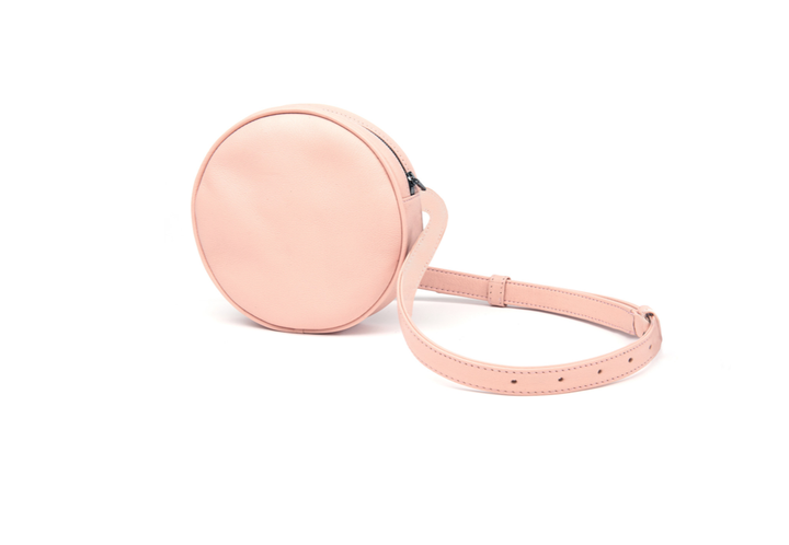 <a rel="nofollow" href="http://mollyshaheen.com/collections/leather-fanny-packs/products/blush-pink-circle-leather-fanny-pac