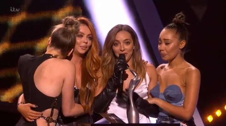 Little Mix on stage at the Brits