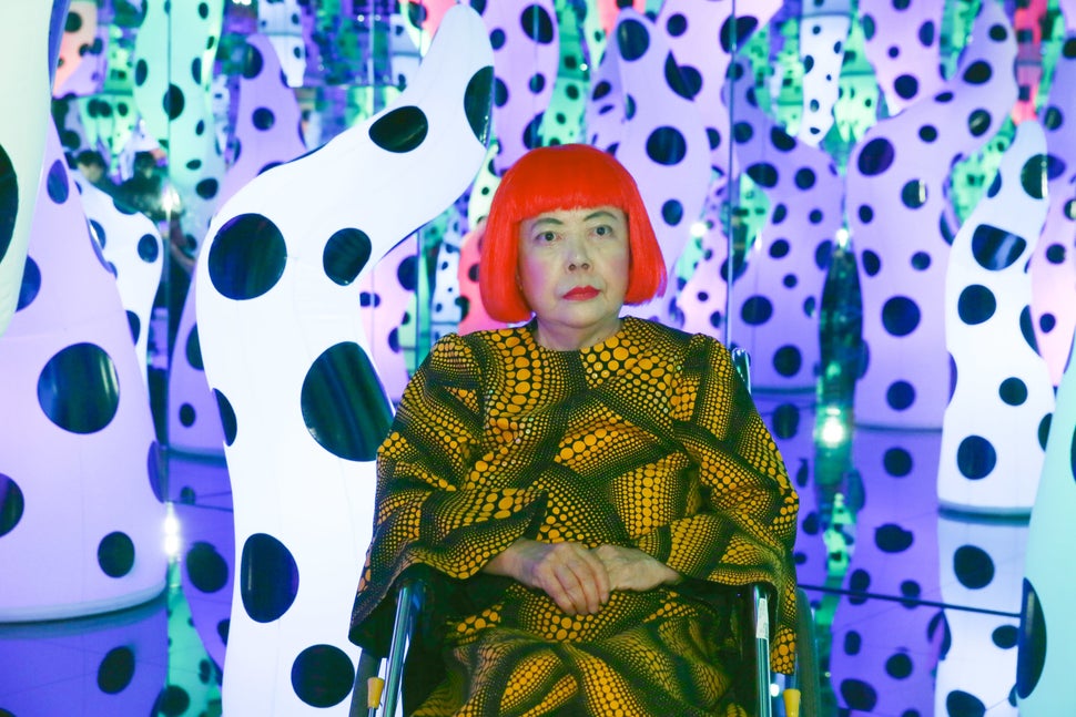 Yayoi Kusama at her own exhibition in 2013.