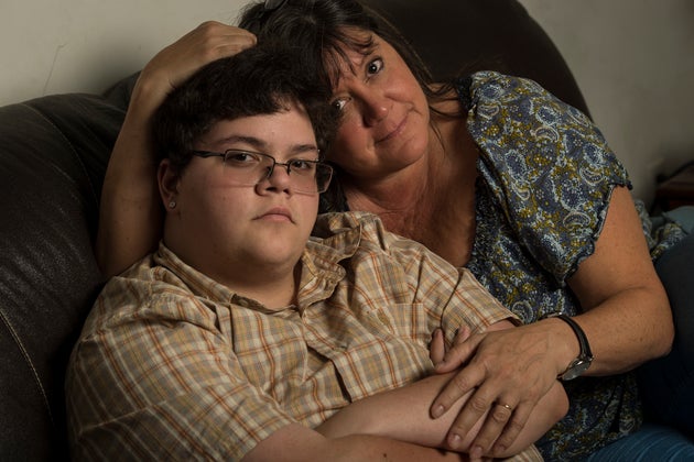 Gavin Grimm, 17, with his mom. Grimm is suing his school district to use bathrooms that match his gender...
