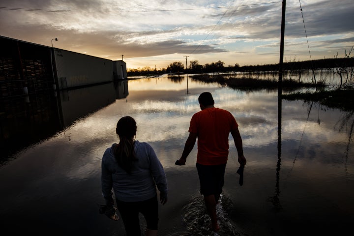 Water continues to rise on a street near the Feather River in Gridley, California, from the Oroville Dam overflow on Feb. 16.