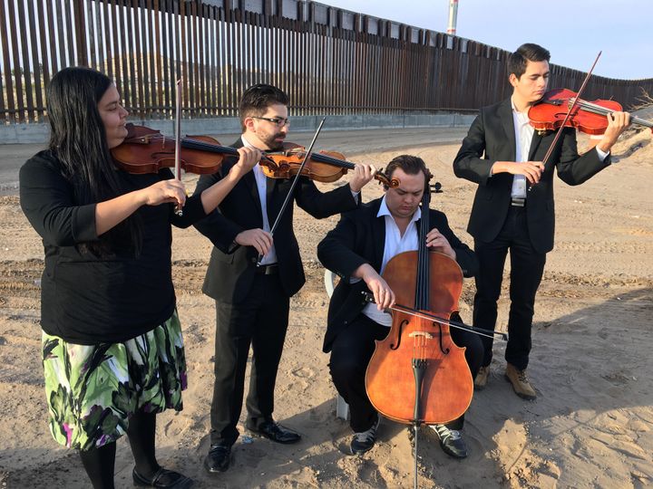UTEP String Quartet: Sandra Rivera, Eduardo Garcia, Nathan Black, Orlando Barajas- perform a piece by Mexcian composer Silvestre Revueltas near the Border Wall.