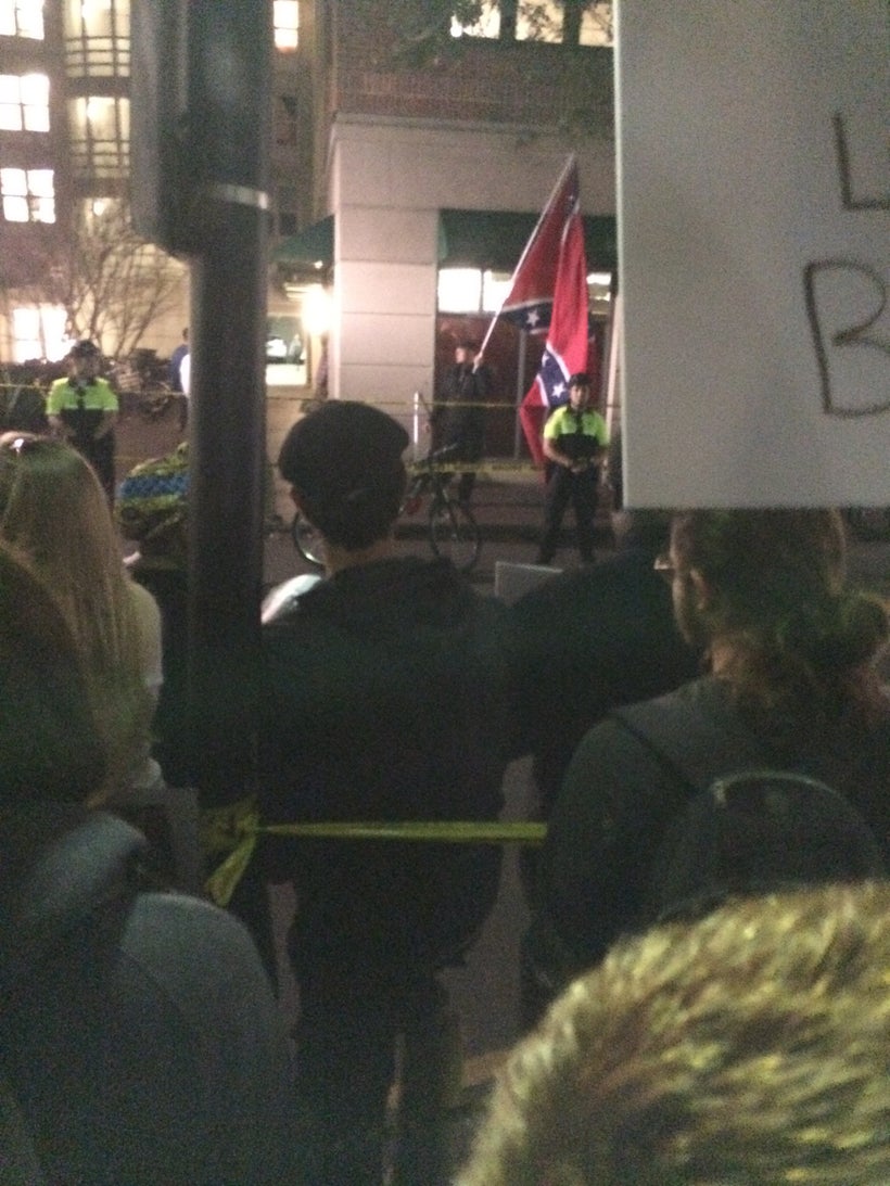 A sea of primarily student protesters greet Confederate enthusiasts at the College of Charleston