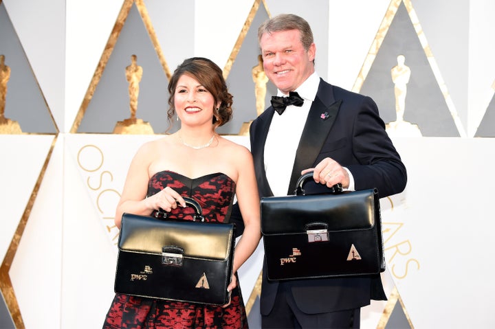 Martha Ruiz and Brian Cullinan walk the red carpet at the 2016 Oscars. 