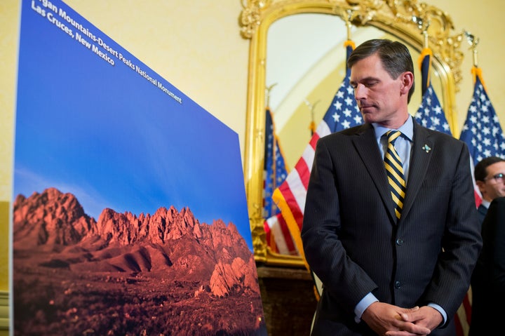 Sen. Martin Heinrich (D-N.M.) views a picture of Organ Mountains-Desert Peaks National Monument in New Mexico during a news conference about how national monuments can help tourism, small business and the economy.