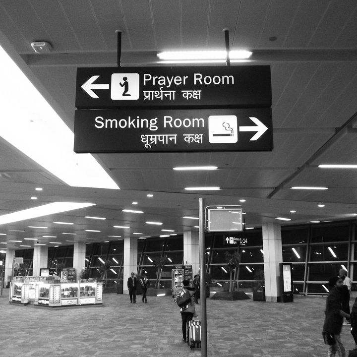 An apt metaphor at Delhi Airport: to unit in prayer, or to go down in smoke — that is our choice.