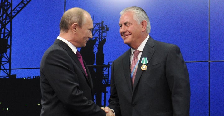 Russia's president Vladimir Putin and now-Secretary of State Rex Tillerson at an award ceremony for employees and chief executives of energy companies at the 17th St Petersburg International Economic Forum. File image, June 21, 2013.