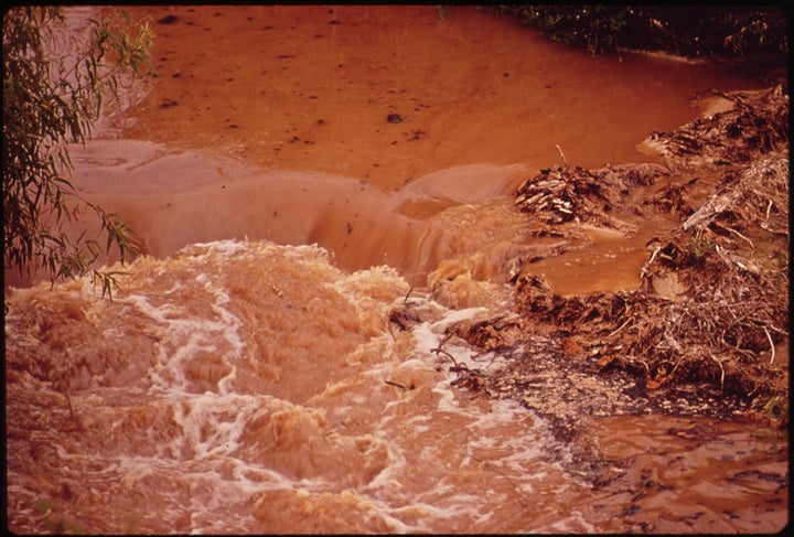 Wastewater from a paper mill in Louisiana pollutes water downstream in 1972. <a href="https://www.flickr.com/photos/usnationa