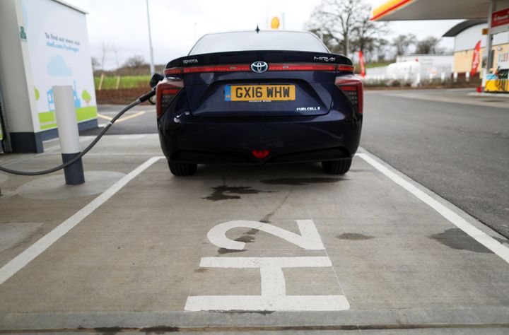 A Toyota Mirai hydrogen car tops up at Cobham services in Surrey