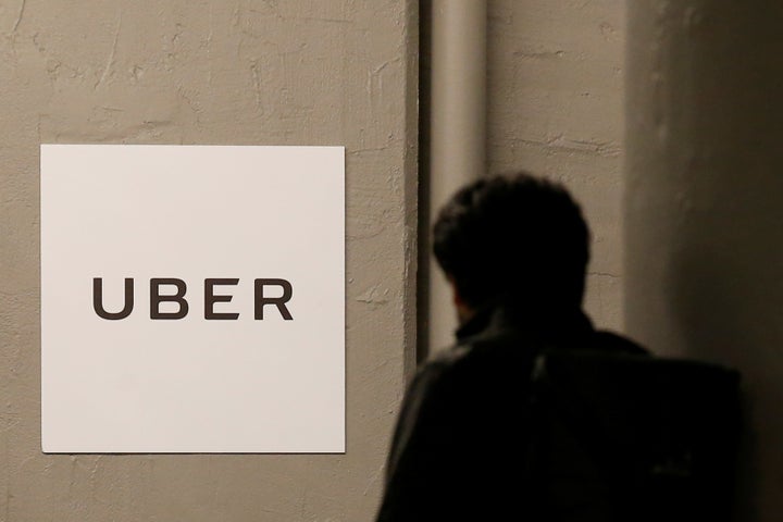 A man arrives at the Uber offices in Queens, New York, February 2, 2017.