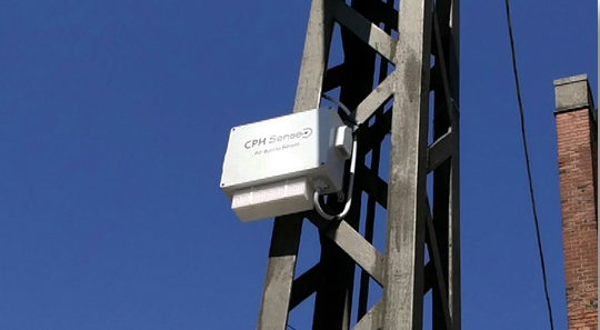 Air quality sensor mounted on a utility stanchion in Central Copenhagen.