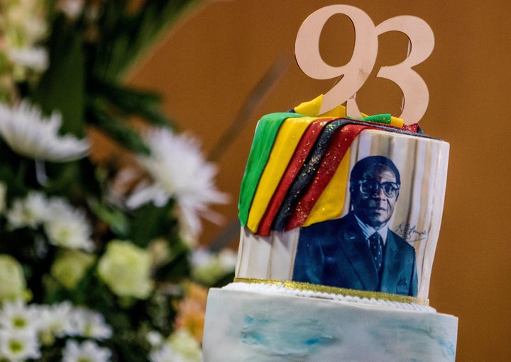 A birthday cake bears a portrait of Zimbabwe's President Robert Mugabe.