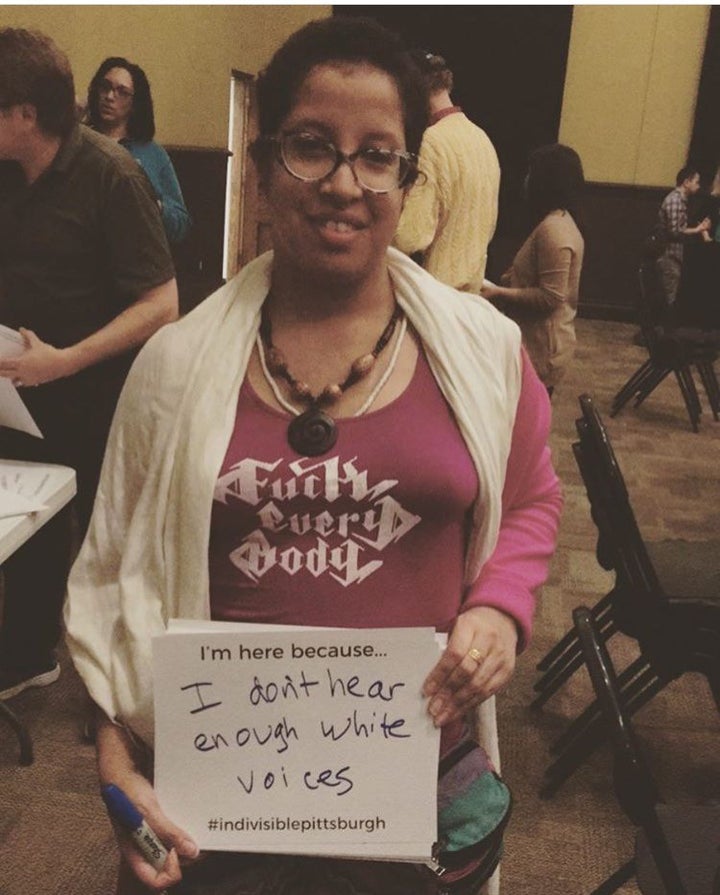 <p>Black Femme Excellence Co. co-founder and feminist activist Sueño Del Mar holds a sign that says “I’m here because I don’t hear enough white voices.” Sueño was approached after the meeting by white Indivisible Pittsburgh leaders who asked her whether she wanted to be involved, not because of her organizing experience, but because of her skin color and the sign she was holding which said “Intersectionality.”</p>