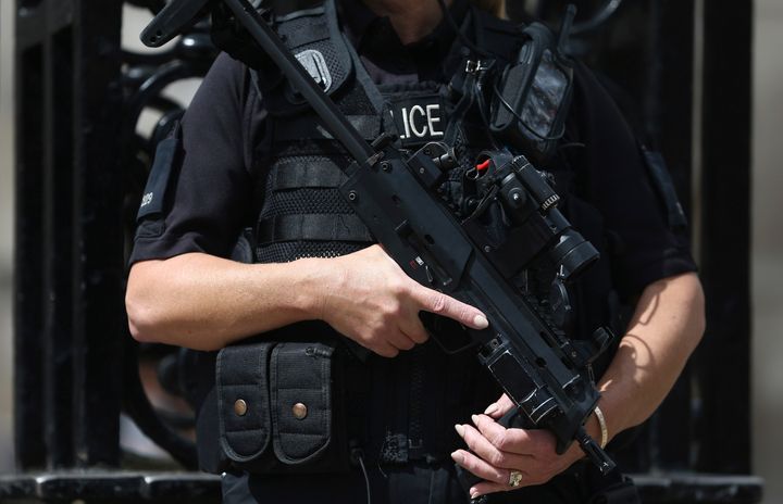 An armed police officer on patrol in London