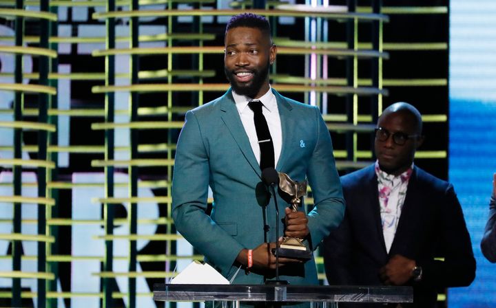 Tarell Alvin McCraney and Barry Jenkins accept the Best Screenplay award for "Moonlight" at the 2017 Film Independent Spirit Awards in Santa Monica, Calif., Feb. 25, 2017.