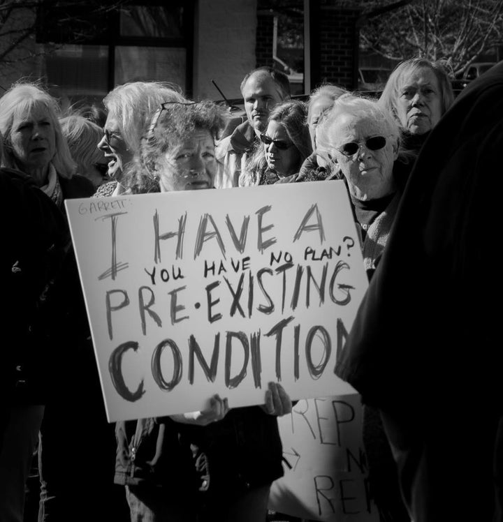 <p>Indivisible Charlottesville protest at Tom Garrett's office against repealing the ACA, 1/31/17, Charlottesville, VA </p>