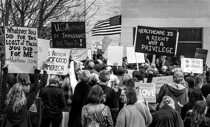 <p>March to Tom Garrett's office in Charlottesville, VA in request for an in-person town hall meeting, 2/7/17 </p>