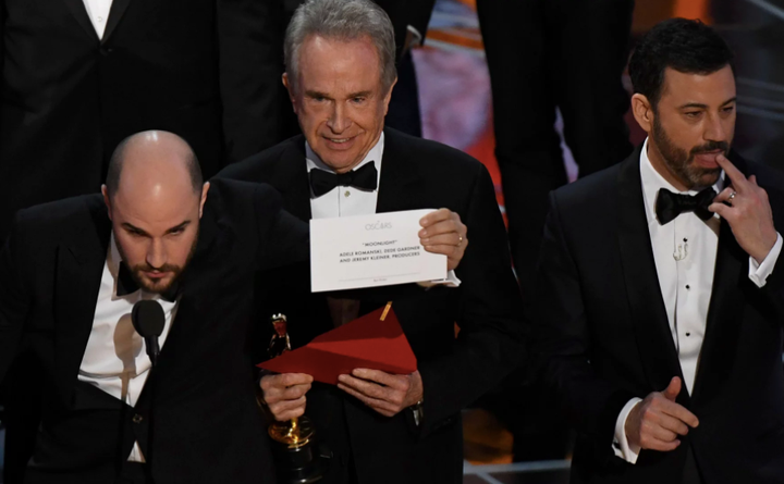 Warren Beatty looked understandably sheepish as he corrected himself