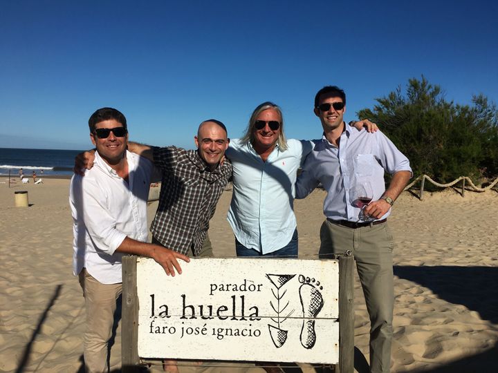 <p>The boys of Bodega Garzon enjoy another unforgettable meal at La Huella</p>