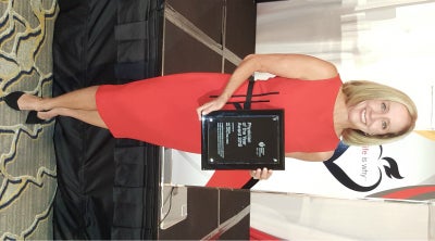 <p>Lori Mosca with the award naming her the 2015 Physician of the Year from the American Heart Association.</p>