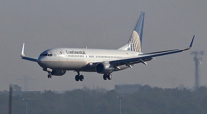 A Continental Airlines Inc. Boeing plane lands at George Bush Intercontinental Airport in Houston, Texas, U.S..