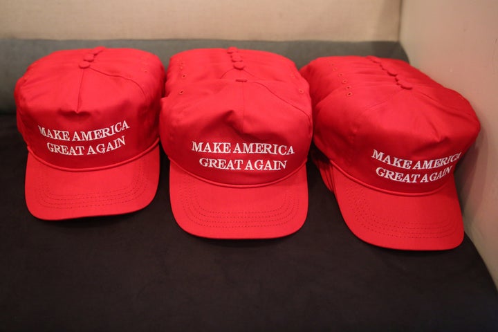 "Make America Great Again" hats are pictured during a meeting with then GOP presidential nominee Trump's Hispanic Adviso