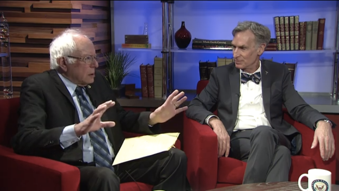 Sen. Bernie Sanders (I-Vt.) asks Bill Nye questions about climate change during a Facebook Live interview Monday.