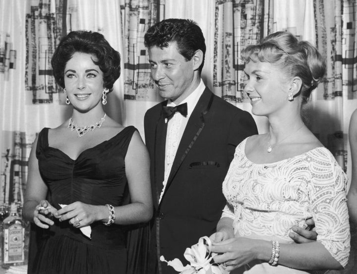 Elizabeth Taylor, Eddie Fisher and Carrie Fisher before the drama of the century. 