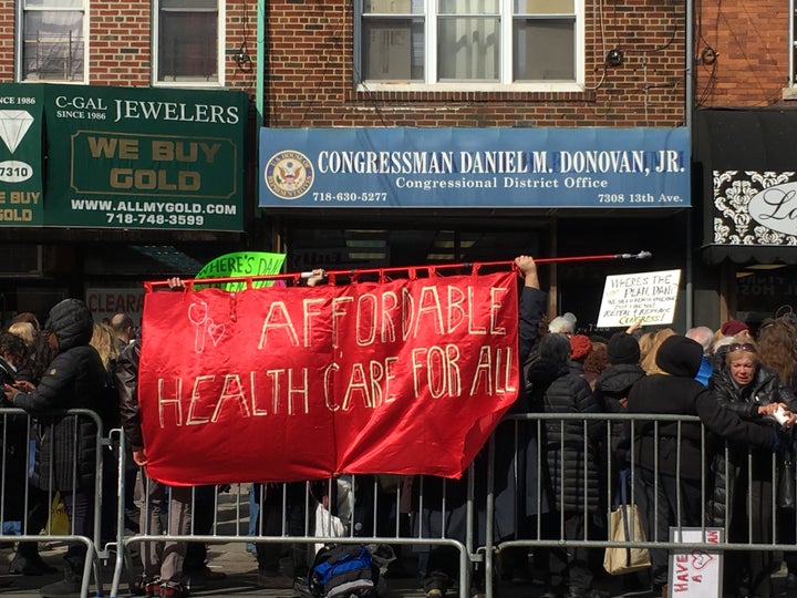 #GetOrganizedBK members contributed a huge sign to a protest demanding affordable health insurance.