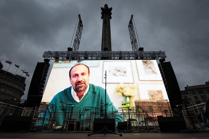 Farhadi addresses the crowd in a recorded video message during the public screening for the film "The Salesman" in Trafalgar Square.