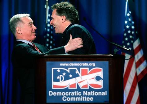 Howard Dean and Terry McCauliff, two former DNC chairs, embracing long ago.