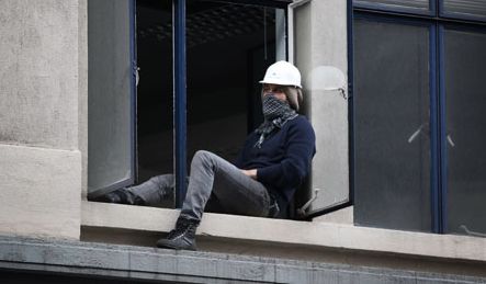 A protestor occupying the vacant UBS office in the City of London in 2011